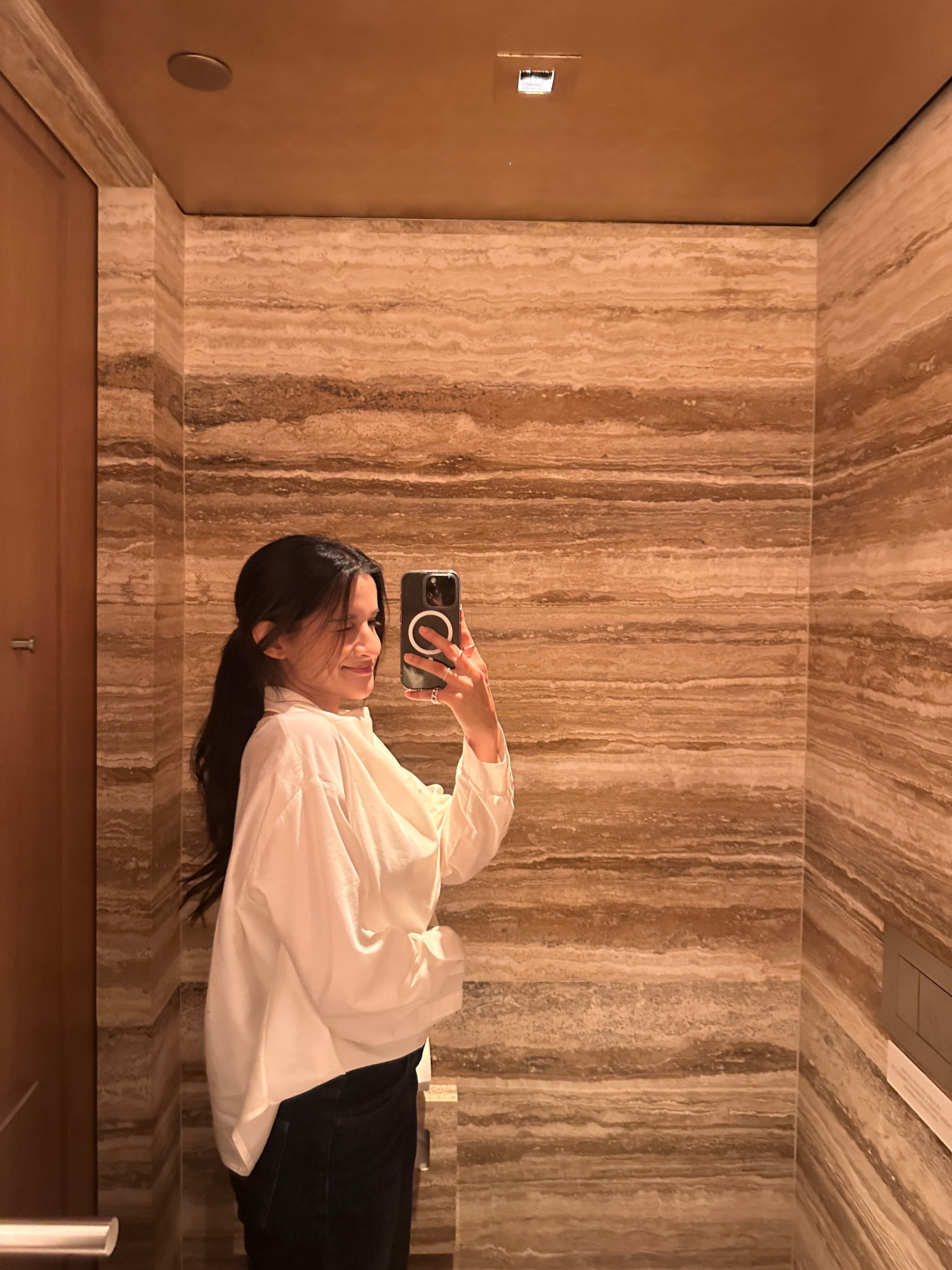 Lavi taking a mirror selfie